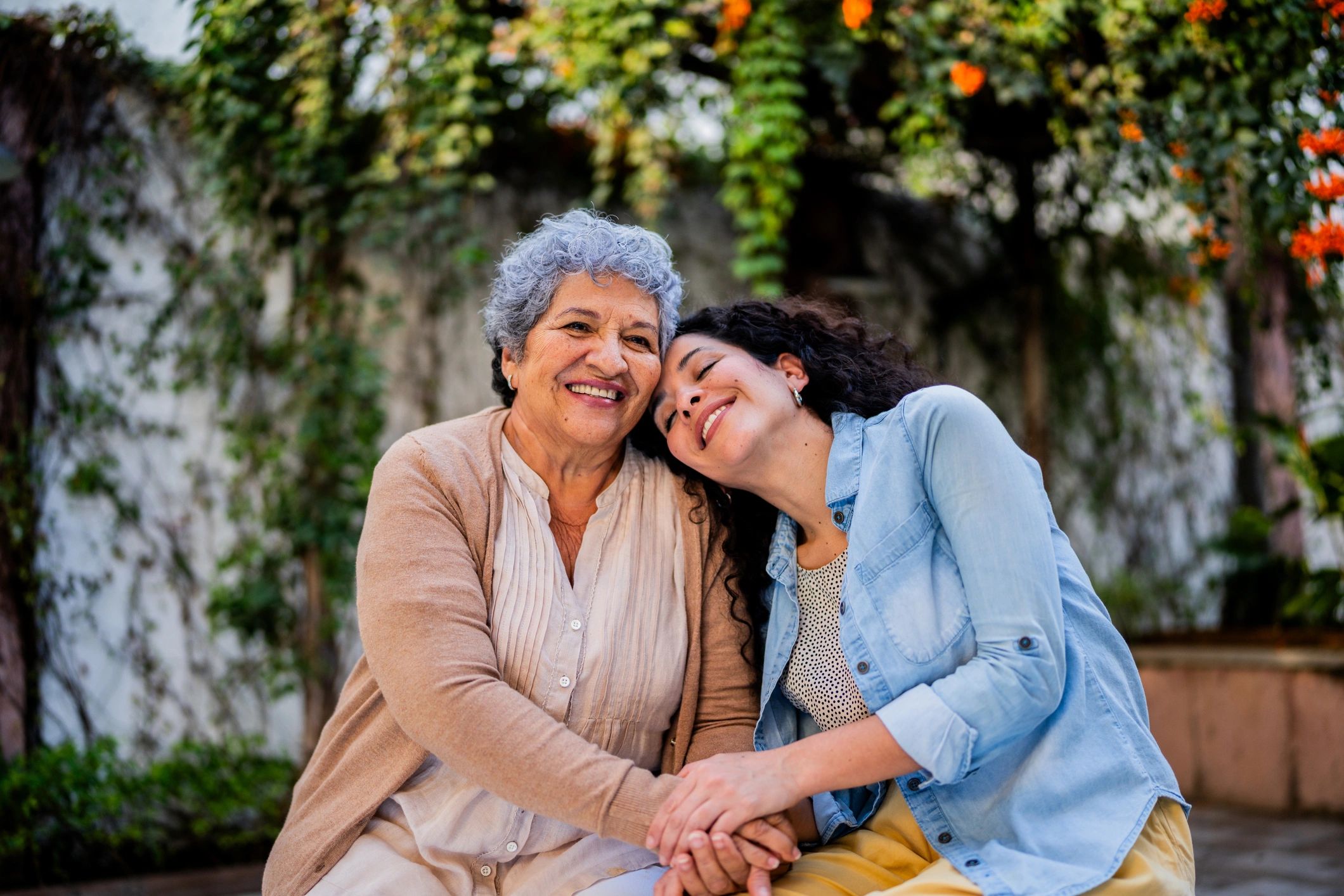 Adult daughter spending time with her mother outdoors